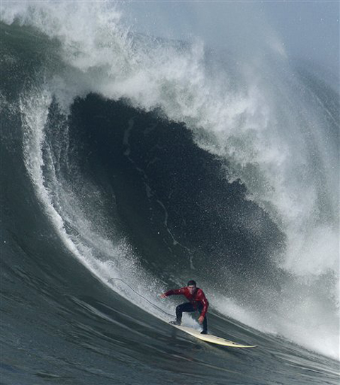 Chris Bertish - winner of the 2010 Mavericks Surf Contest - slides into a macker
