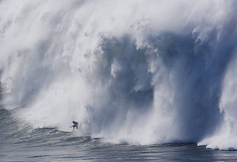 An unknown contestant tried to out run the Pacific Ocean dumping on his back